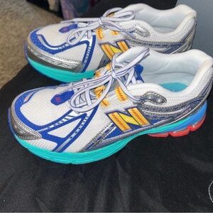 New Balance White and Blue Sneakers with Yellow Accents